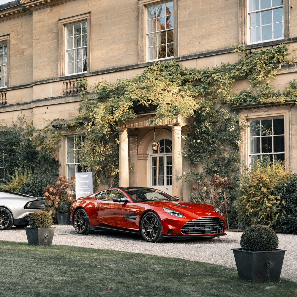 Aston Martin Vanquish outside a country house at its UK launch